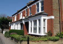 Photo of red brick house